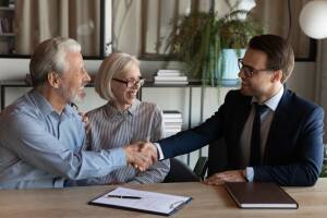Couple having an equity release meeting after choosing a good equity release advisor